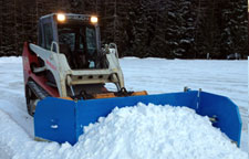 snowplow with one wing forward 45 degrees and the other back 45 degrees.